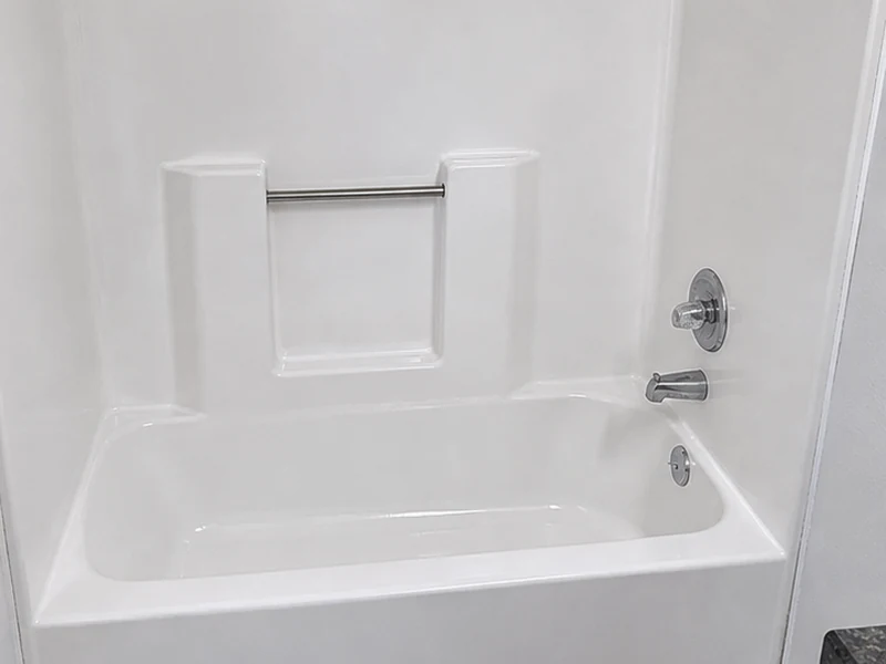 Refinished glossy white fiberglass tub in a Cherryland apartment bathroom, Hayward, CA